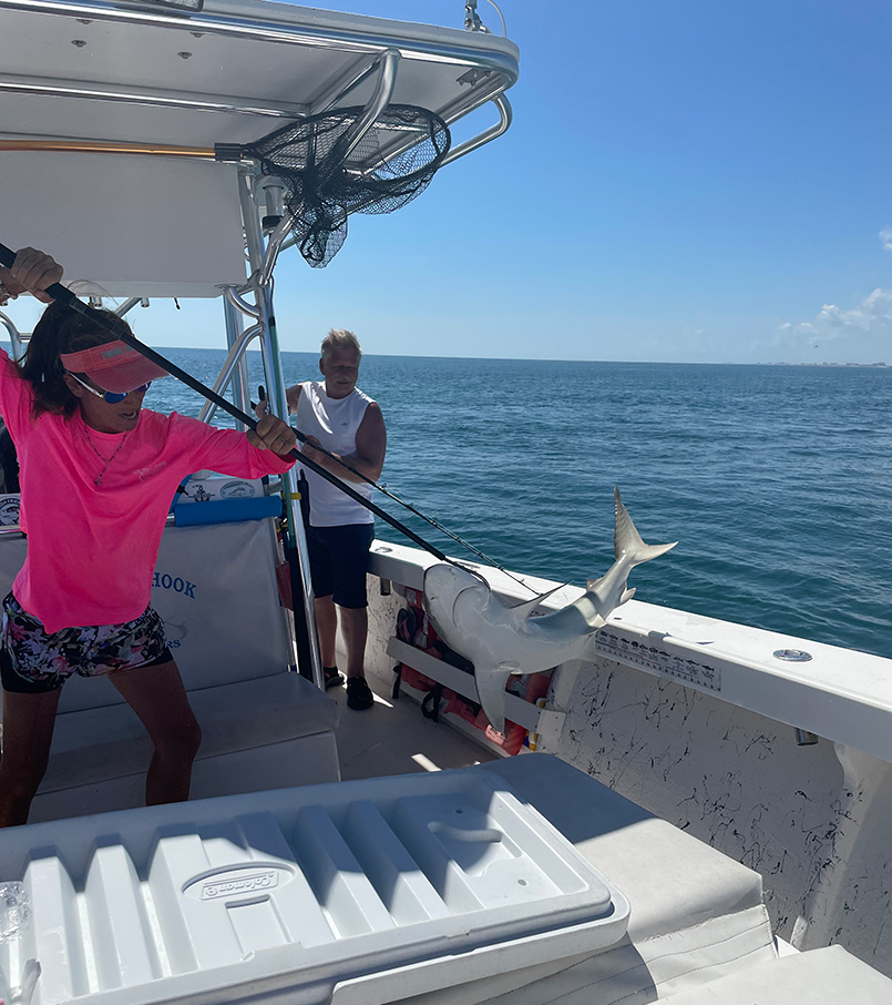 Melissa gaffing a shark